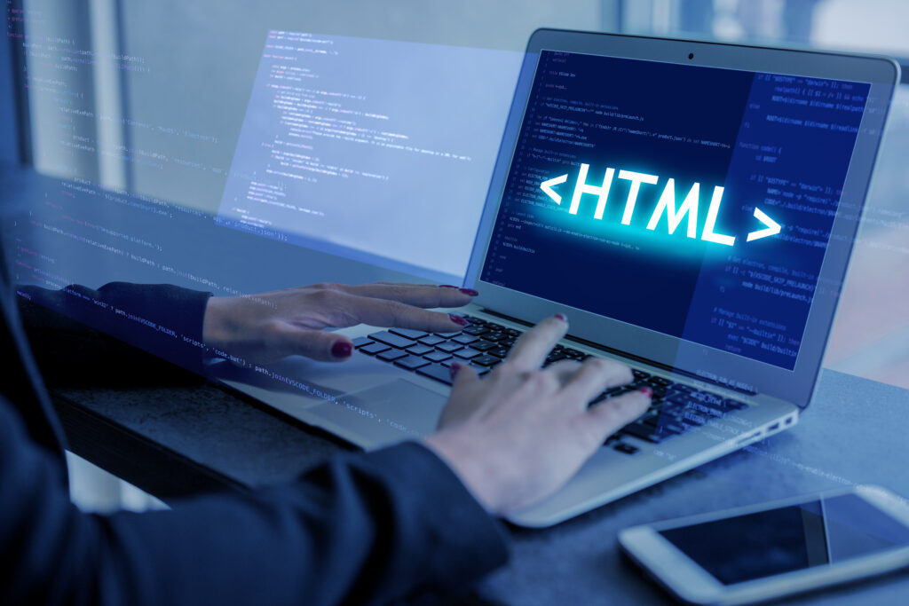 man coding on website