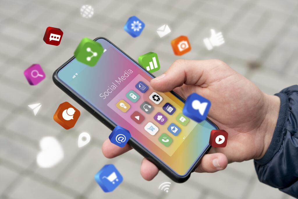 man using mobile with social media apps