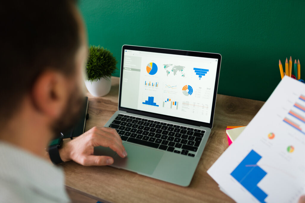 man looking on google analytics on his PC