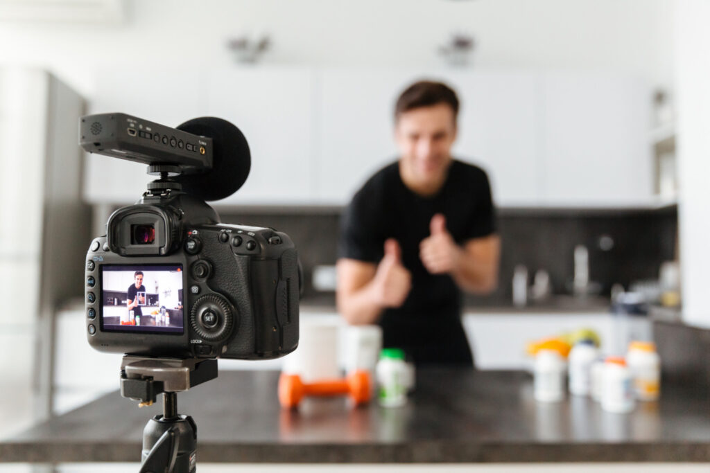 a man filming video in his camera