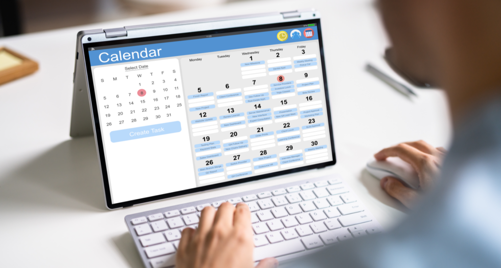 a person scheduling post on calendar